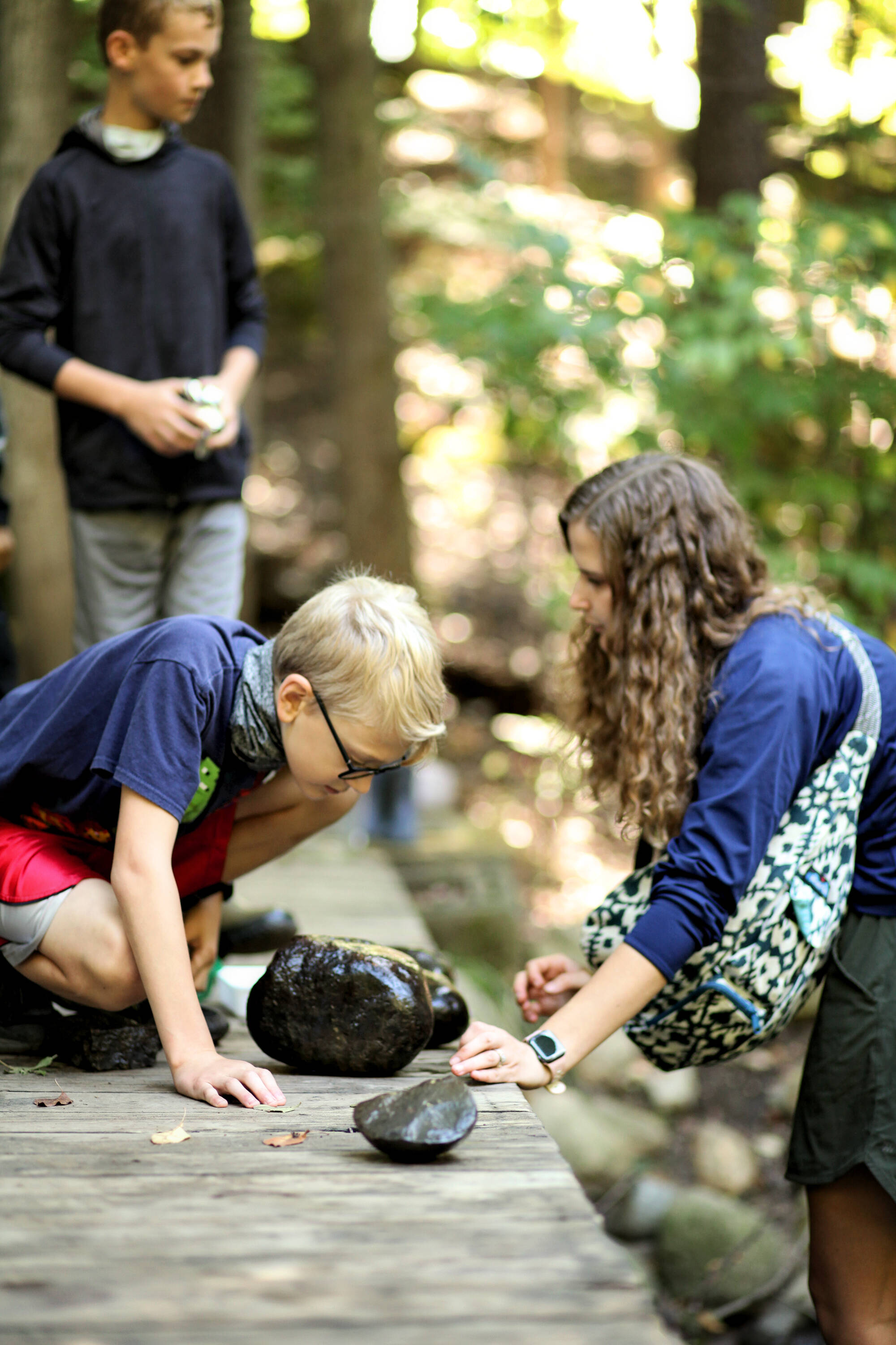 Photo of Students Looking at Rocks